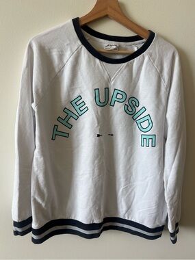 The Upside White Sweatshirt with blue and silver Trim